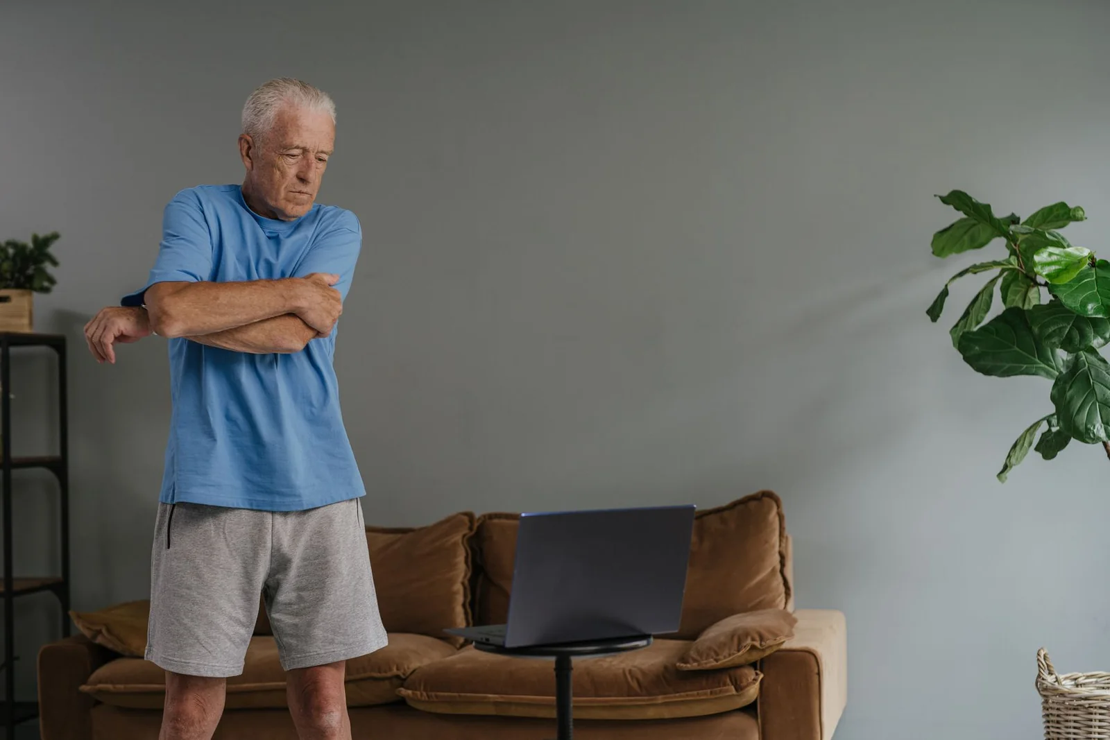 Mature man doing a comfortable gentle stretch